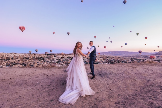 session wedding couple in cappadocia turkey with hot air balloons