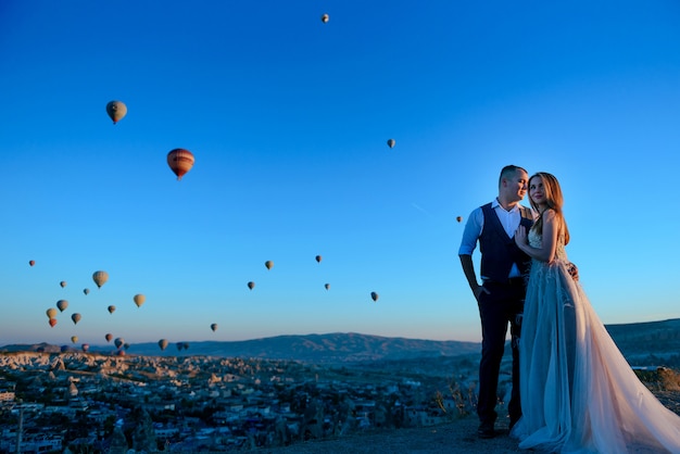 session wedding couple in cappadocia turkey with hot air balloons