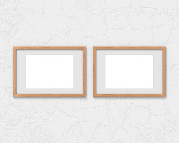 Set of 2 horizontal wooden frames with a border hanging on the wall. 3d rendering.