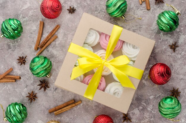 A set of assorted apple marshmallows in a gift box. New Year's decor.