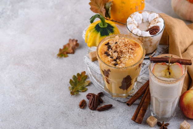 Set of autumn smoothie with pumpkin apple and pecan