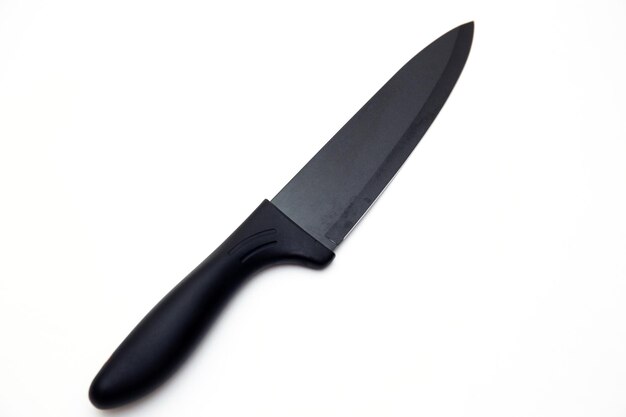 Foto set di coltello da cucina di lusso nero isolato su bianco