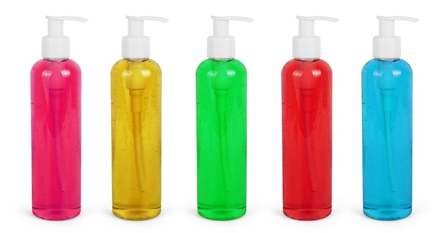 Impostare una bottiglia di plastica vuota verde, gialla, rosa, arancione e rossa utilizzata per shampoo o sapone. studio girato isolato su sfondo bianco