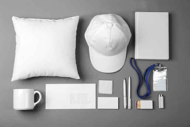 set of blank items for branding on grey background