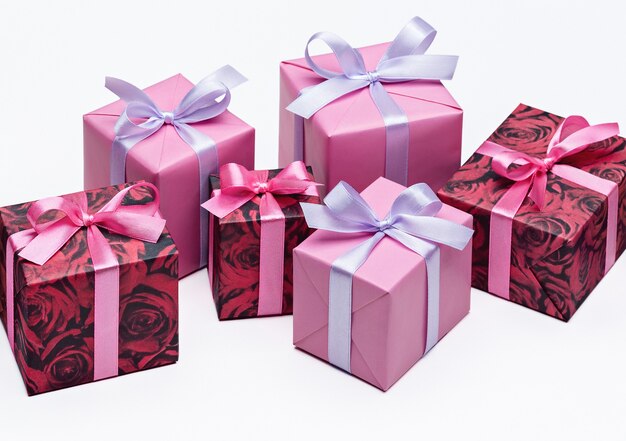 Set of bright colorful gift boxes with ribbons