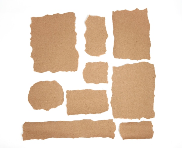 A set of brown torn paper with the word paper on it