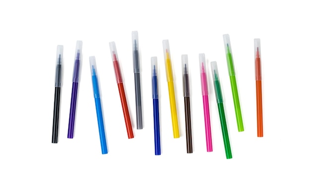 A set of capped markers isolated on a white background