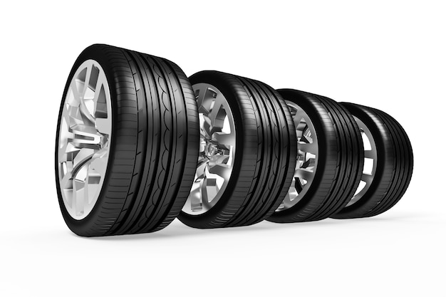 Set of car wheels isolated over white surface