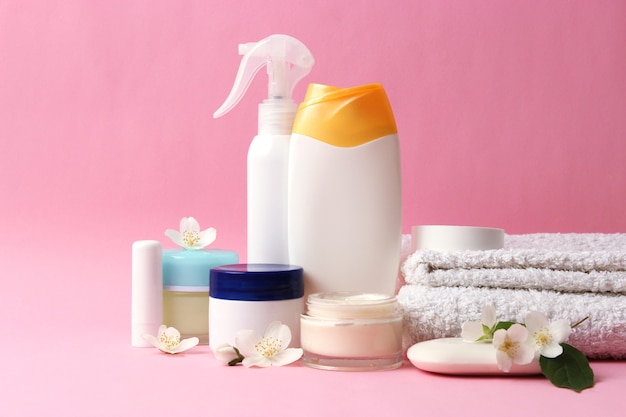 set of care cosmetics on a colored background