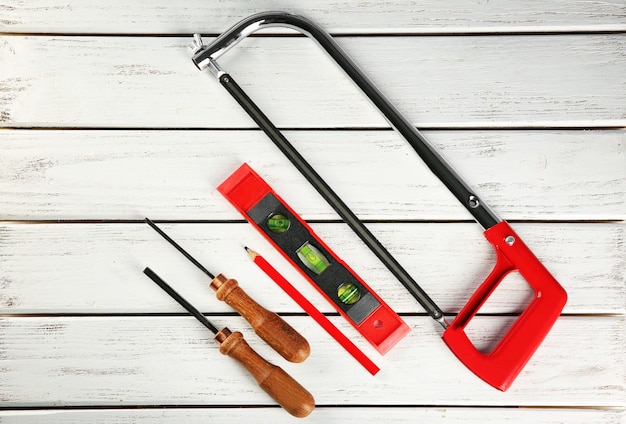 Set of carpenter's tools on wooden 