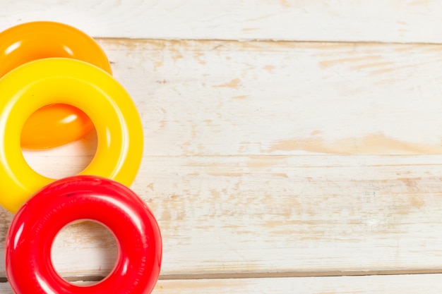 Set of children toys on wooden table