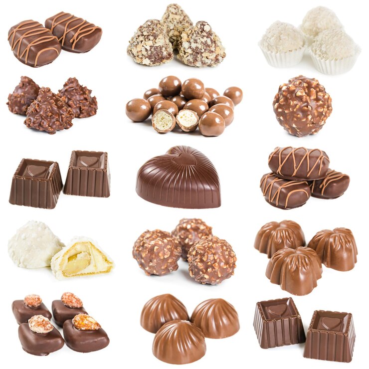 Photo 白い背景で隔離のチョコレート菓子のセット