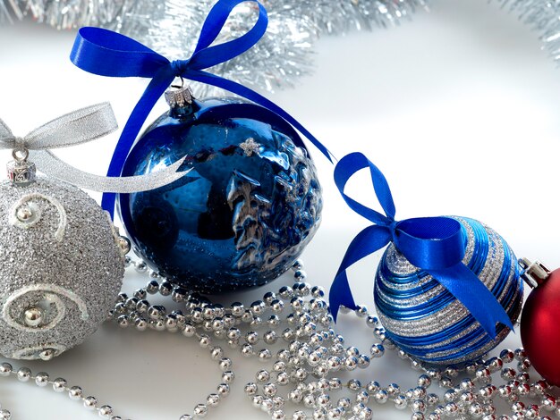 Set Christmas bauble with ribbon on white 