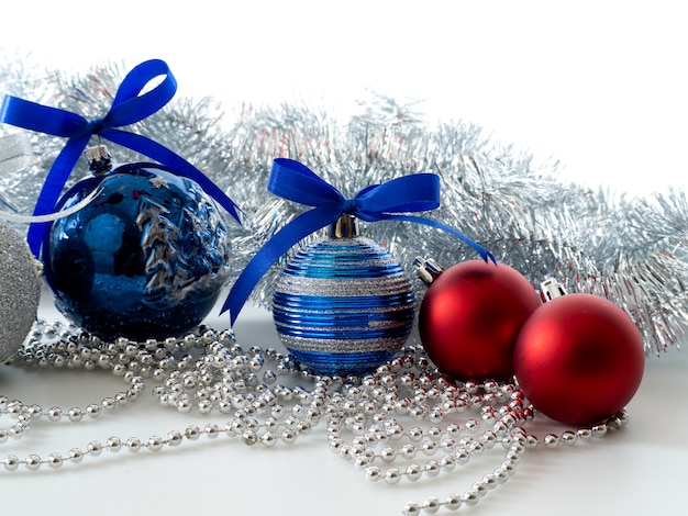 Set Christmas bauble with ribbon on white 