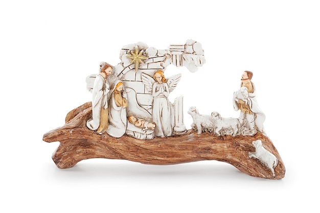 Set of christmas nativity scene and angel figurines isolated on\
white background