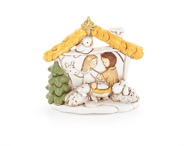 Set of christmas nativity scene and angel figurines isolated on\
white background