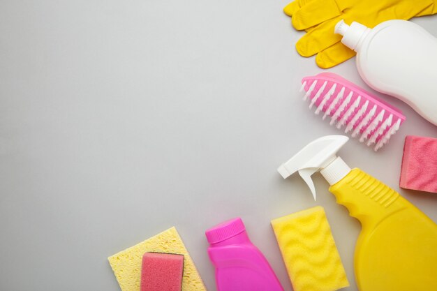 Set of cleaning tools on a grey.