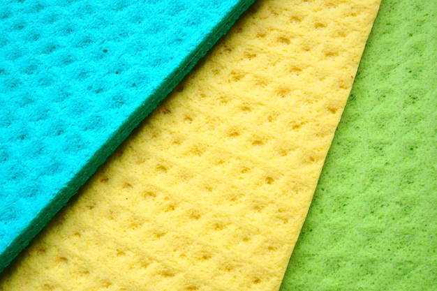 A set of cleaning wipes microfiber cloths or sponges for the
kitchen three multicolored cloths spong