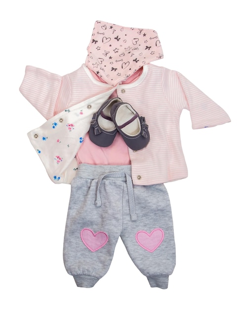 Set of clothes for baby girls pants jacket shoes on a white isolated background Fashion for newborns