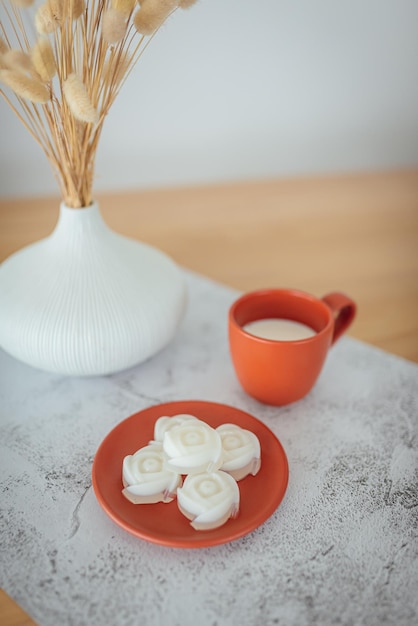 A set of coconut milk jelly desserts with a cup of milk on the table selective focus