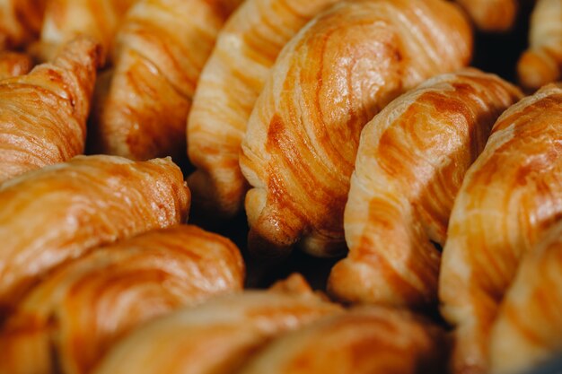 Set of coffee break in the hotel during conference meeting, with tea and coffee catering, decorated catering banquet table with variety of different pastry and bakery, with croissants and cookies