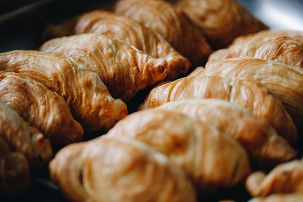 Set of coffee break in the hotel during conference meeting, with tea and coffee catering, decorated catering banquet table with variety of different pastry and bakery, with croissants and cookies