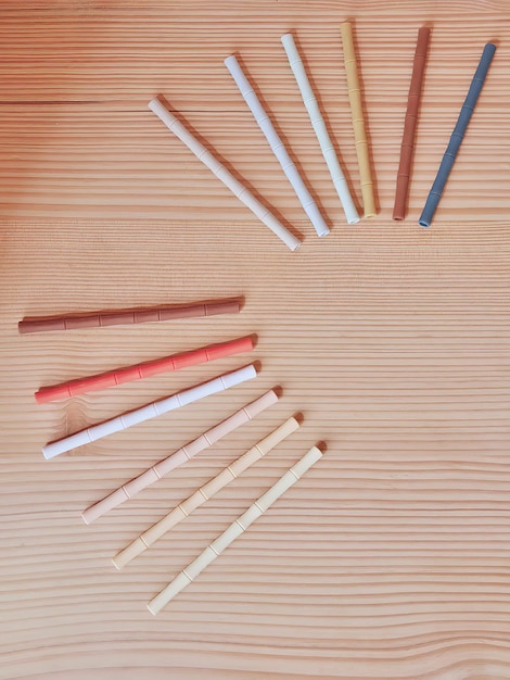 set of color paper drinking straws on the table high angel shot