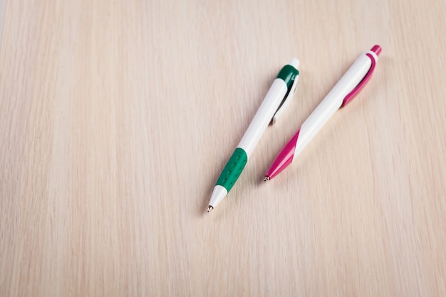 Set of colored pens on table