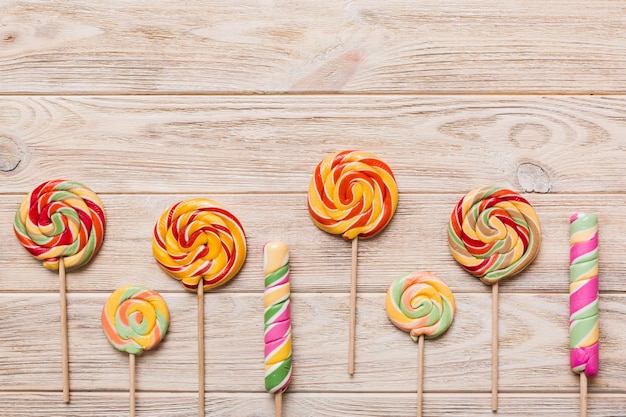 Set of colorful lollipops on colored background Summer concept Party Happy Birthday or Minimalist Concept