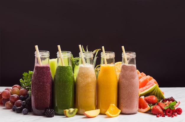 The set of colorful smoothies with exotic fruits