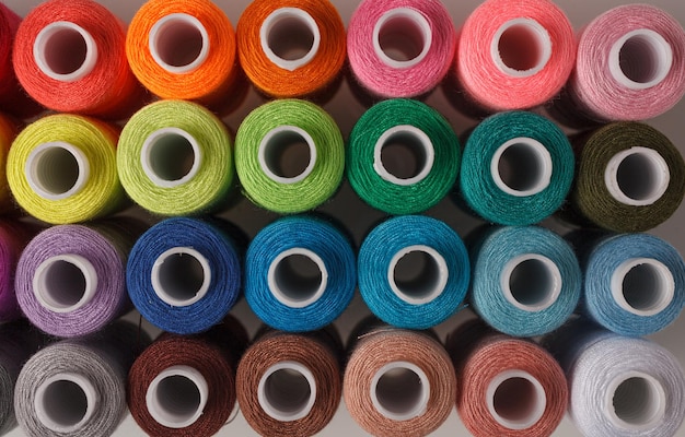 Photo set of colorful spools of thread