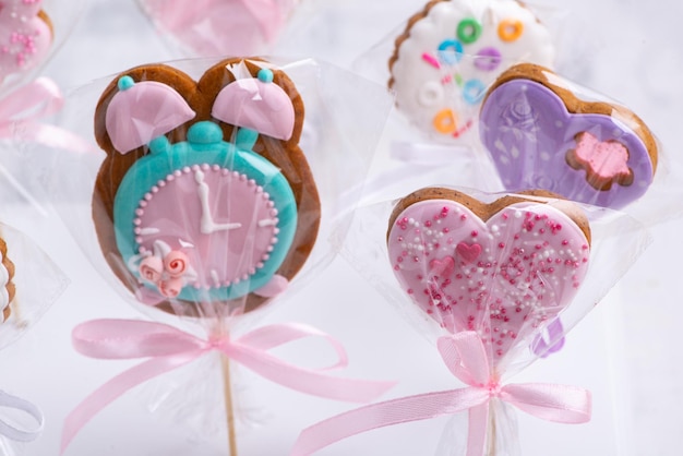 Set of colorful and sweet cookies on a stick