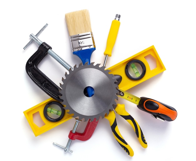 Photo set of construction tools isolated at white background, top view