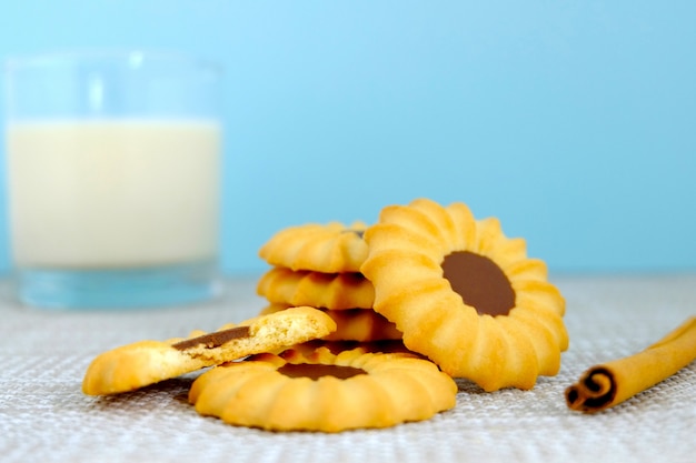 Set of cookies and cinnamon on table, Chocolate cookies, Bakery on vintage background