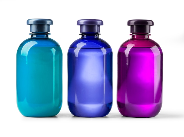 Set cosmetic bottles on white background