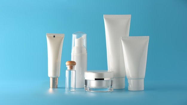 Set of cosmetic products on a color background.