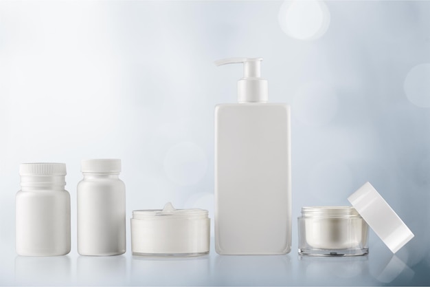 Set of cosmetic products on light background