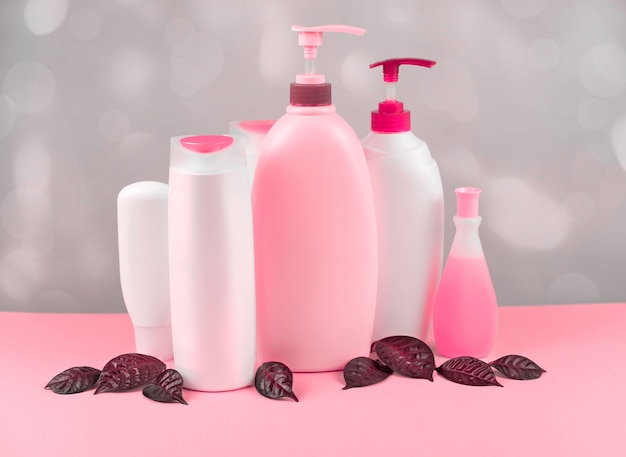 A set of cosmetics for the body tinted image coral.