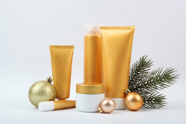 Set of cosmetics and christmas decor a set of care cosmetics for body