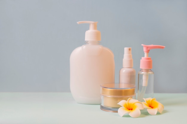 a set of cosmetics in jars and bottles with cream, soap  for skin care