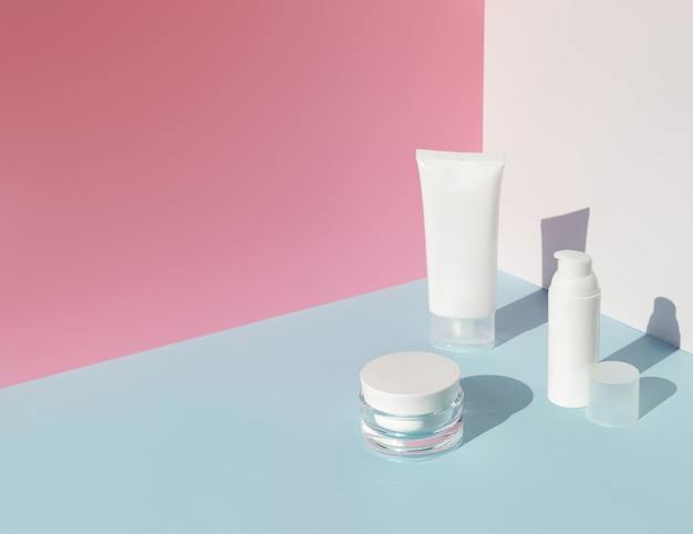 Set of cosmetics with sunlight. Summer body care beauty treatment concept