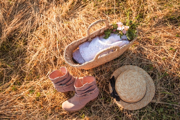 Set of country style clothes on dry hay