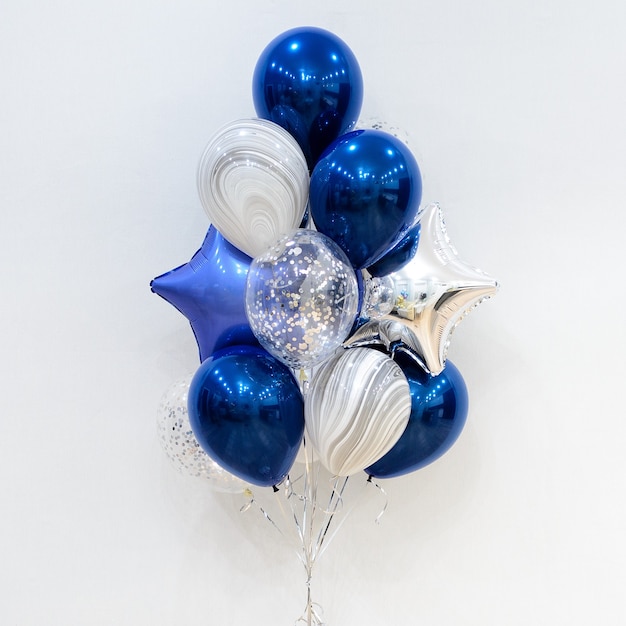 Set of deep blue and silver helium balloons