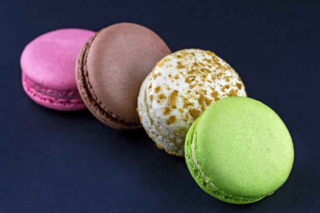 Set of delicious macaroons in a row