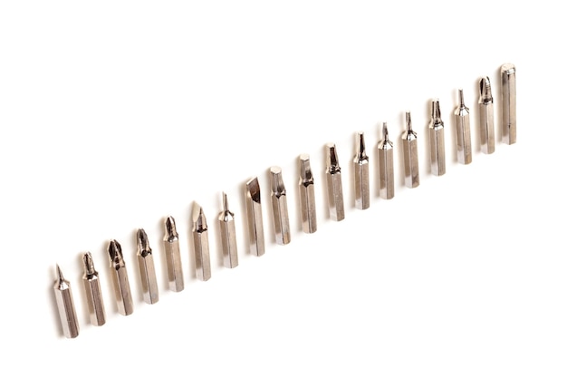 A set of different attachments for a head screwdriver with a screwdriver on a white background