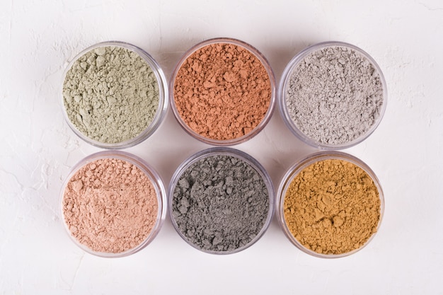 Set of different cosmetic clay mud powders