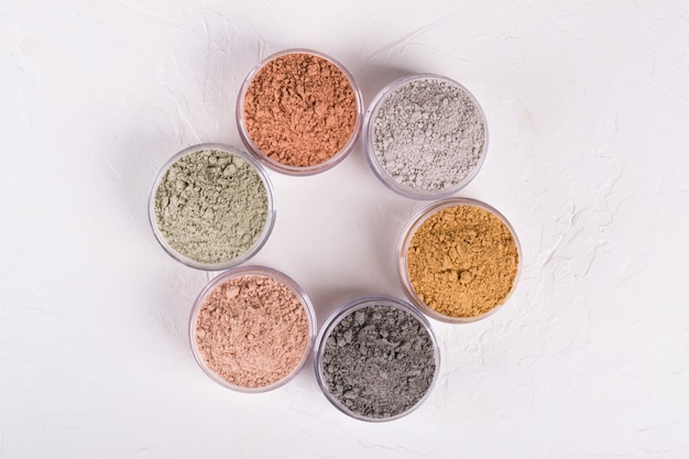 Set of different cosmetic clay mud powders