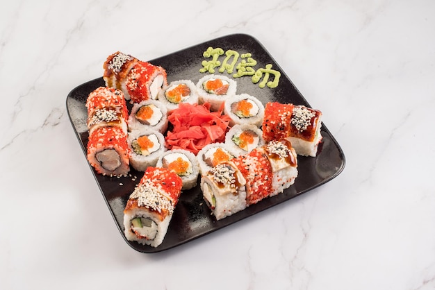 Set of different fresh tasty sushi rolls on white background