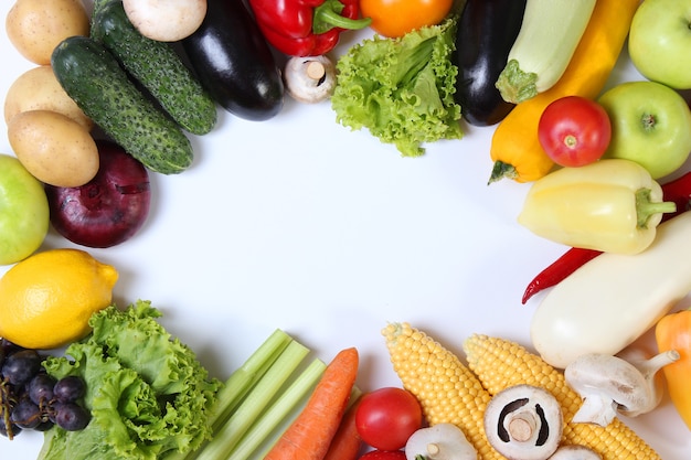 Set of different fresh vegetables on a white background top view