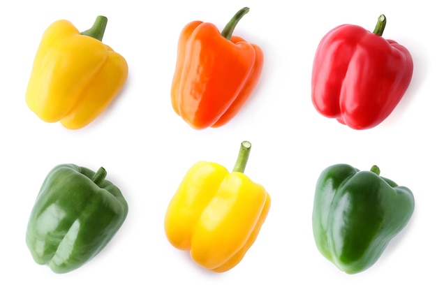 Set of different ripe bell peppers on white background